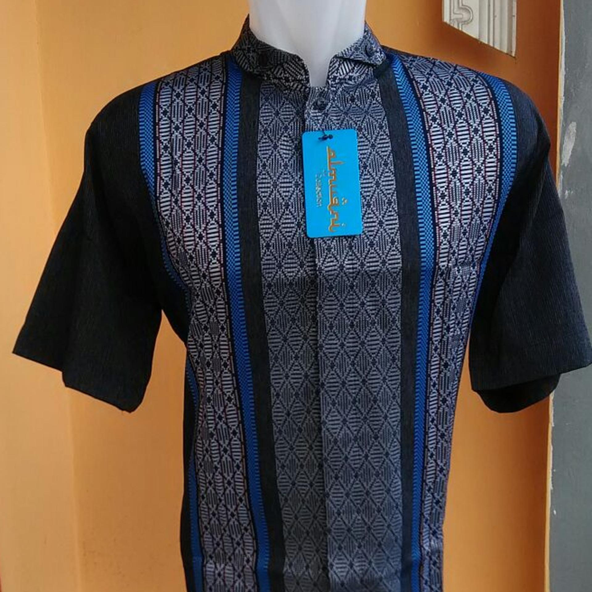 Baju koko kombinasi songket elegan