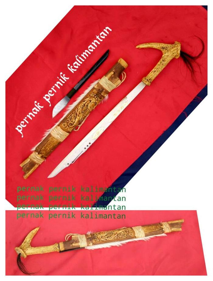 mandau motif sarung ukir timbul balut kulit asli