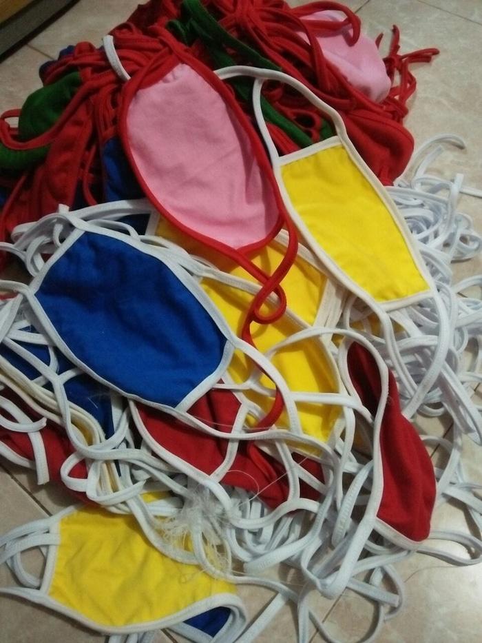 Masker kain dua lapis, kuat dan lembut saat digunakan.