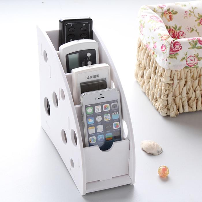 Tempat remote AC , TV , HP , / rak penyimpanan organizer warna putih KTR / rak penyimpanan organizer / rak penyimpanan organizer terbaru / ak penyimpanan organizer modern / ak penyimpanan organizer unik / ak penyimpanan organizer murah