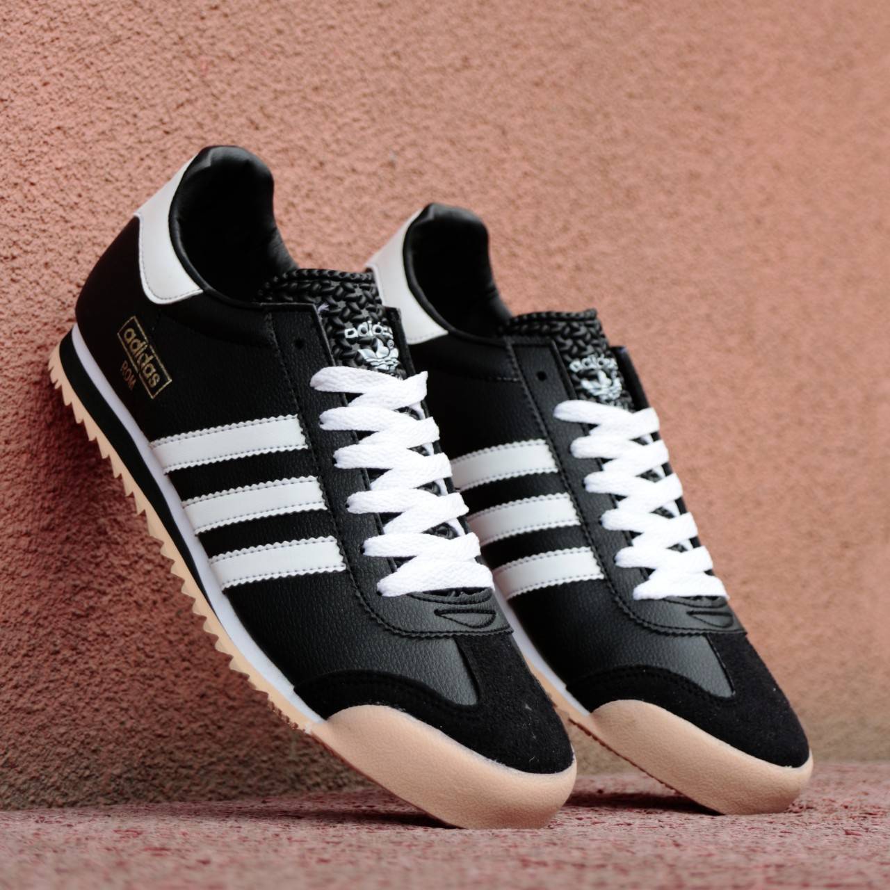 retro black adidas trainers