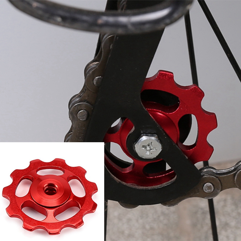 1ชุด11T จักรยานอัลลอยอลูมิเนียมอัลตราไลท์กลางแจ้งแกนพลาสติกร่องด้านหลัง Derailleur รอกจักรยาน-สีแดง